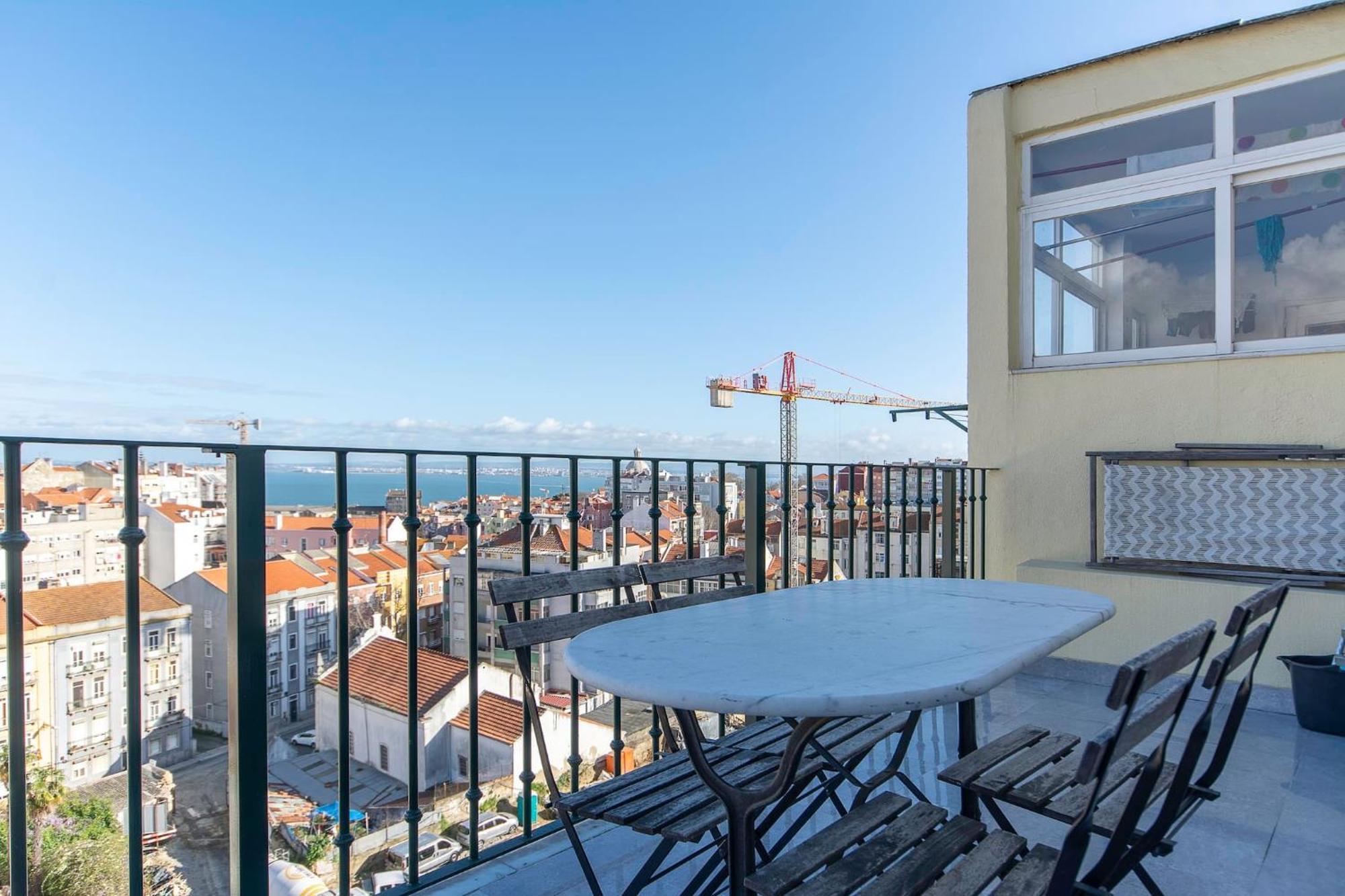 Amidst The Rooftops Of Apartment Lisbon